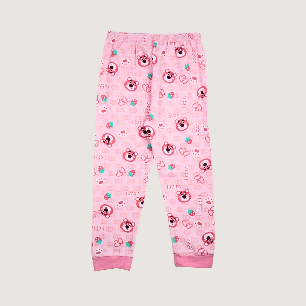 Pink children's pajama pants with cartoon bear pattern on a light gray background