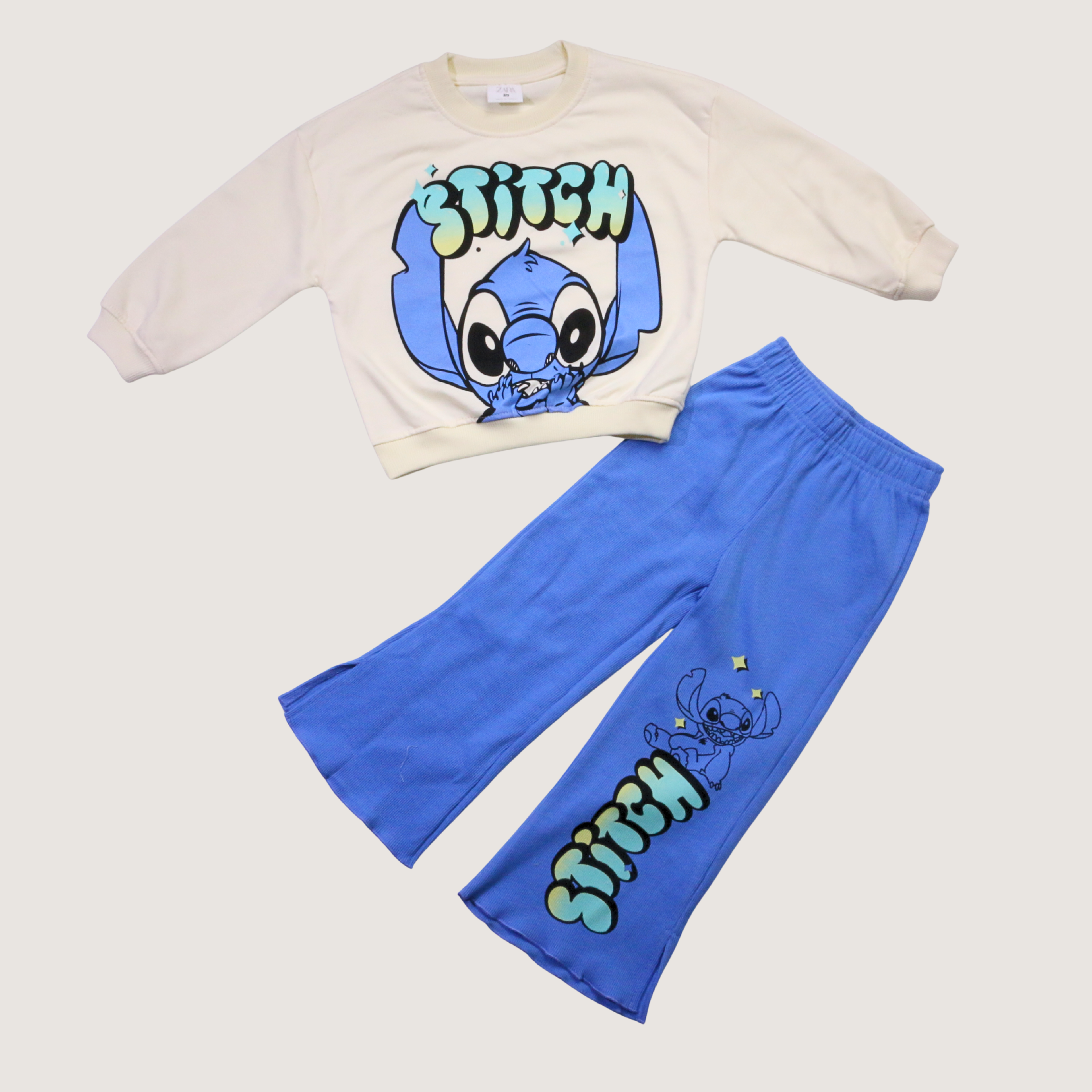 بيجامة Stitch Cosmic Cream بأكمام طويلة (للجنسين)
