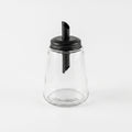 Black-lidded glass sugar bowl